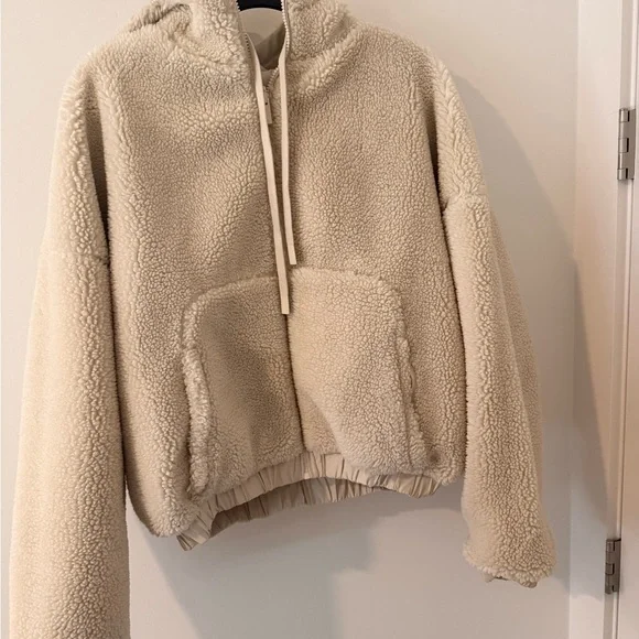 Alo Yoga Duality Sherpa Reversible Jacket in Cream and White - Picture 6 of 9